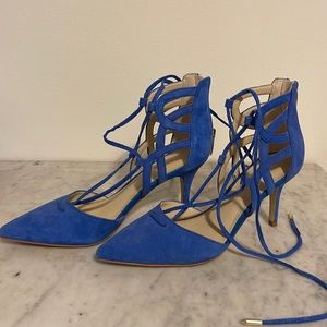 Blue suede kitten heal. Zipper at back but also has ankle ties